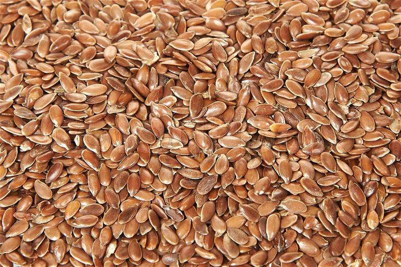 Closeup of Brown flax seeds, stock photo