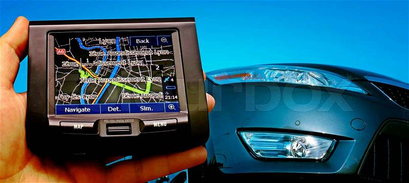 Grate car isolated on blue. gps in a man hand, stock photo