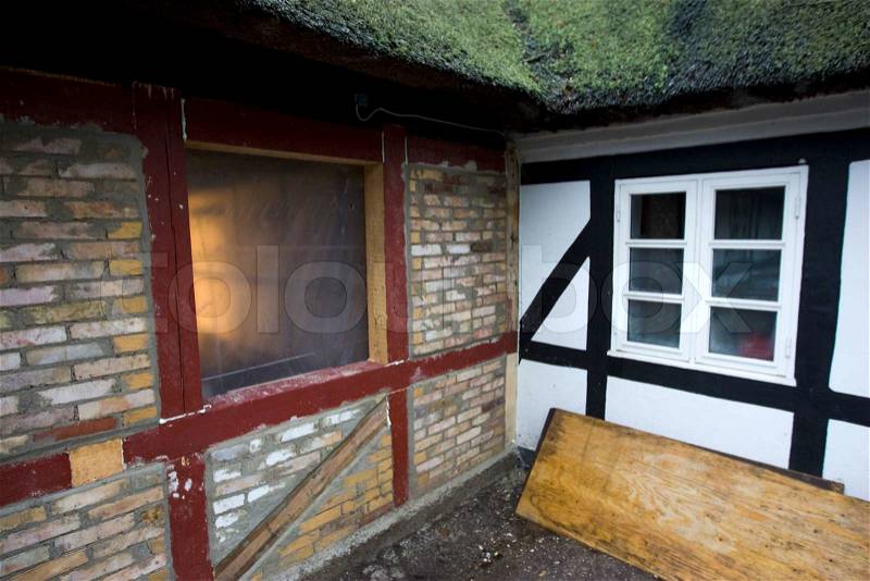 Walls of an old house getting renovated, stock photo