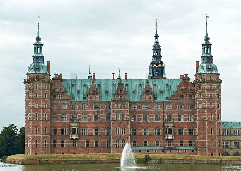 Frederiksborg Castle located in Hillerød, Denmark, stock photo