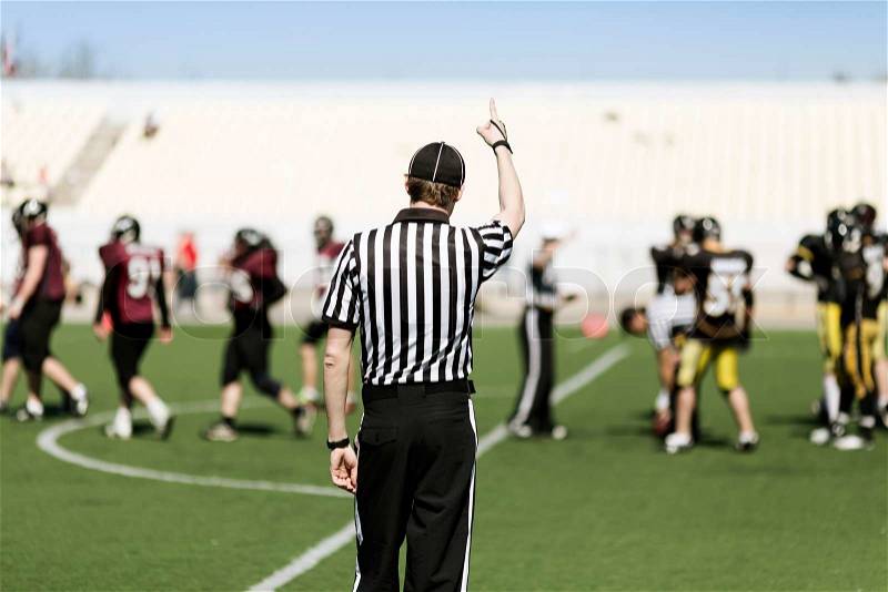 football referee from behinde , selective focus on his back, stock photo