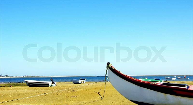 Fishing boats on beach, Algarve, Portugal, Western Europe. , stock photo