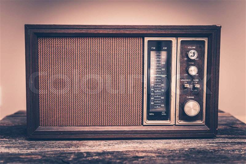 Vintage Wooden Radio in Vintage Color Grading. Early 80s Radio Device Front View, stock photo