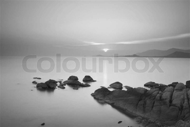 Long exposure dramatic tropical sea and sky sunset in black and white tone, stock photo