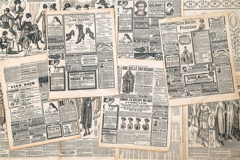 Newspaper pages with antique advertisement, stock photo
