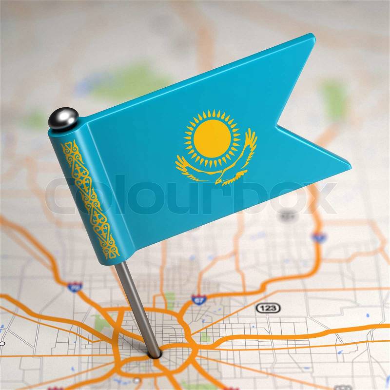 Small Flag of Kazakhstan on a Map Background with Selective Focus, stock photo