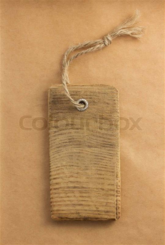 Price tag label at paper textured background, stock photo