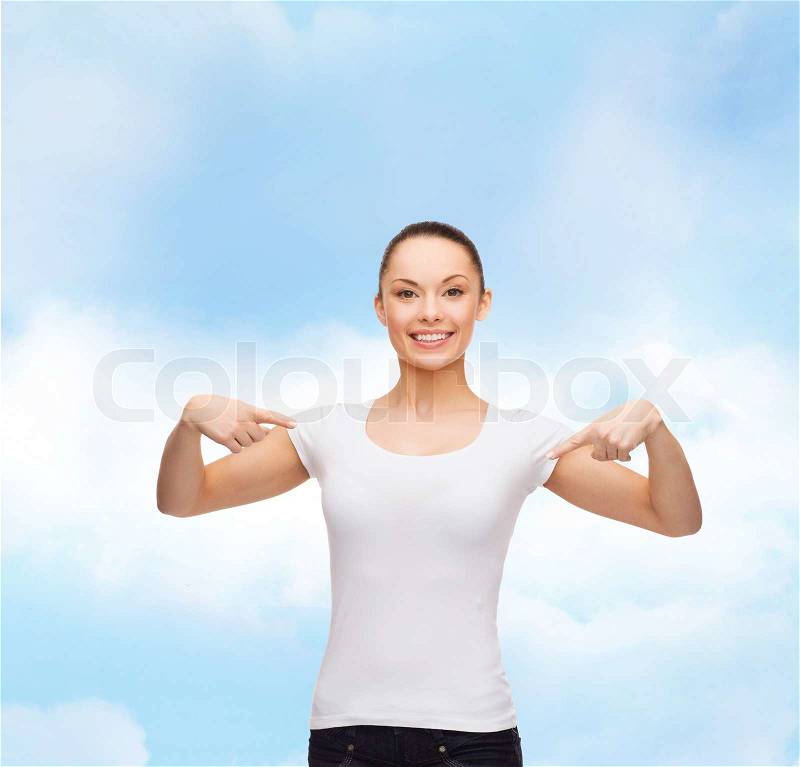 T-shirt design concept - smiling woman in blank white t-shirt, stock photo