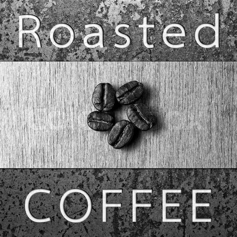 Roasted Coffee text banner and Roasted Coffee Beans on texture, monotone color, stock photo