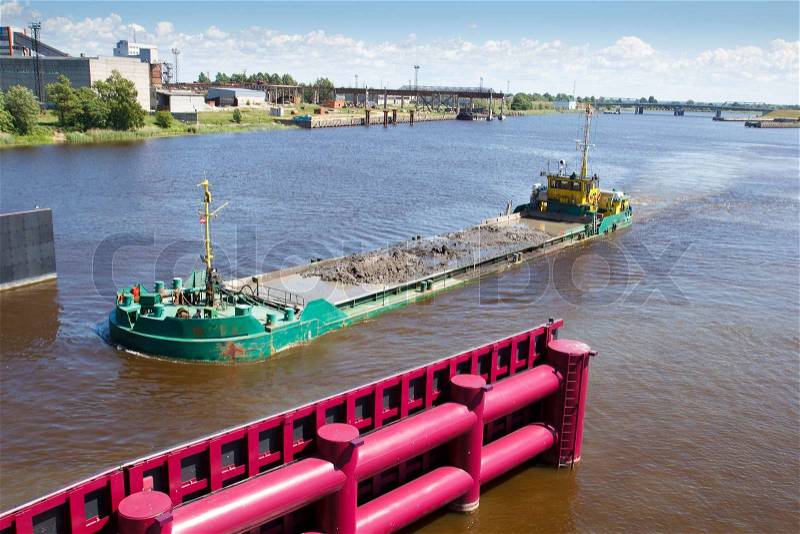 Water transport, barge ride down the river, stock photo