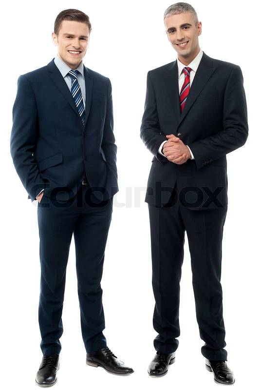 Full length portrait of two businessmen, stock photo