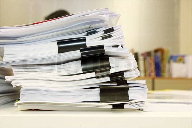 Pile of documents on the office desk, stock photo