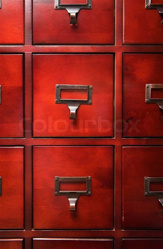 Lustrous Wooden Card File Cabinet in Dramatic LIght, stock photo