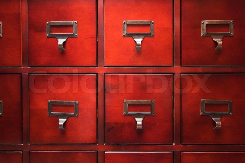 Lustrous Wooden Card File Cabinet in Dramatic LIght, stock photo