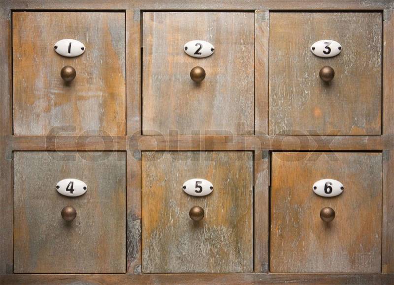 Detailed Antique Wood Filing Cabinet Drawers Image, stock photo