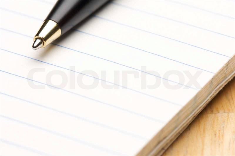 Pen and Pad of Lined Paper, stock photo