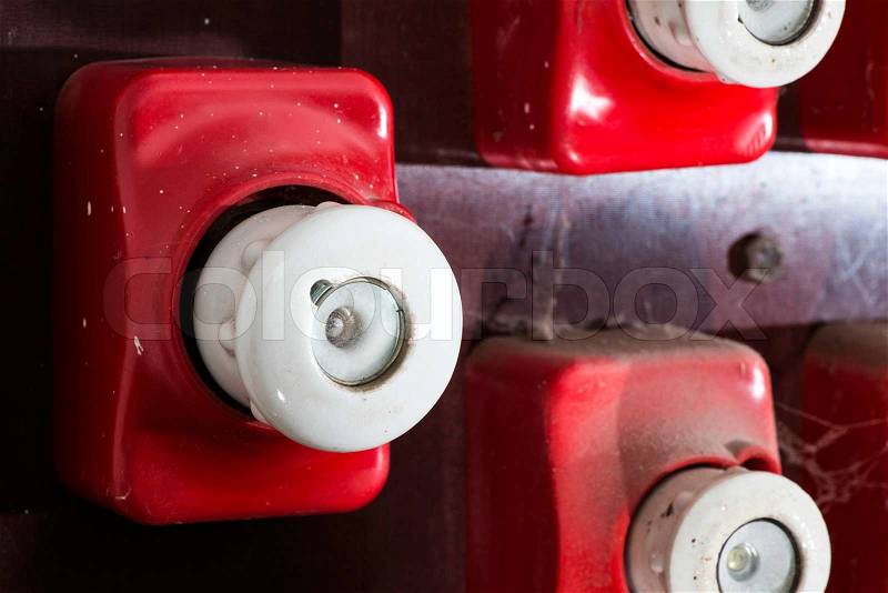 Red vintage electrical fuse. Switchboard, stock photo