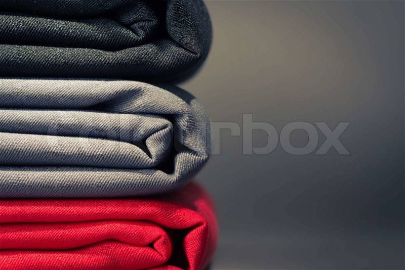 Folded cloths stack with space for text, stock photo