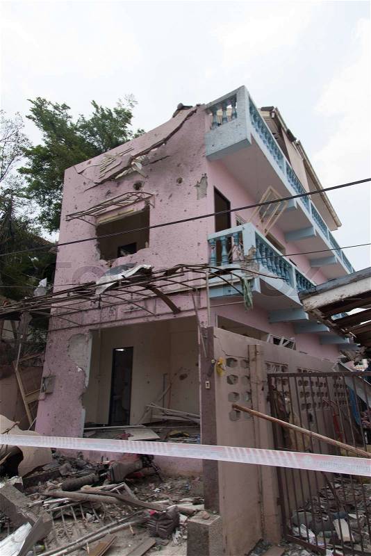 Home damaged by bombs, stock photo