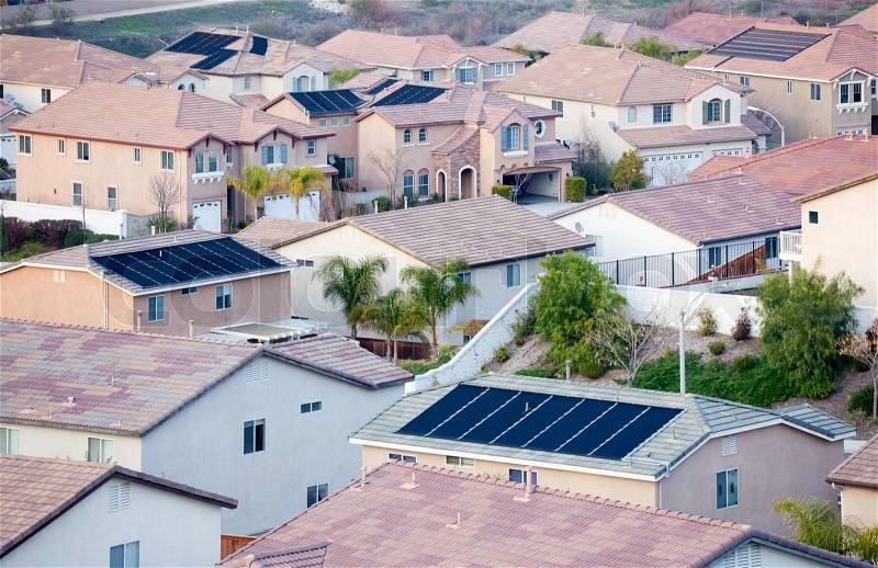Contemporary Neighborhood Roof Tops View with Solar Panels, stock photo