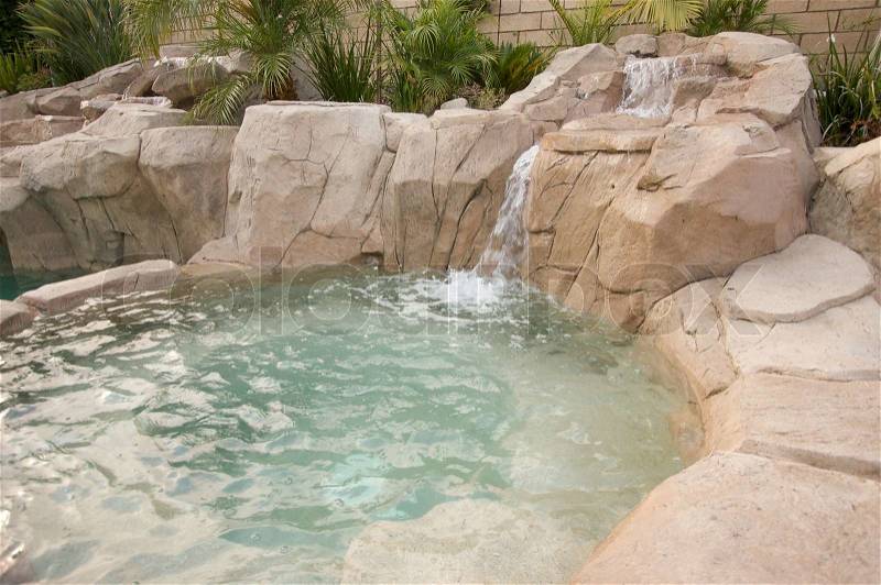 Tropical Custom Pool with waterfalls, stock photo
