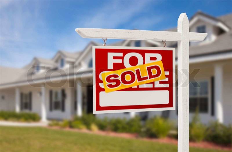 For Sale Sold Real Estate Sign and New House, stock photo