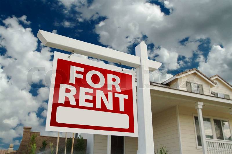 Right Facing Red For Rent Real Estate Sign in Front of Beautiful House, stock photo