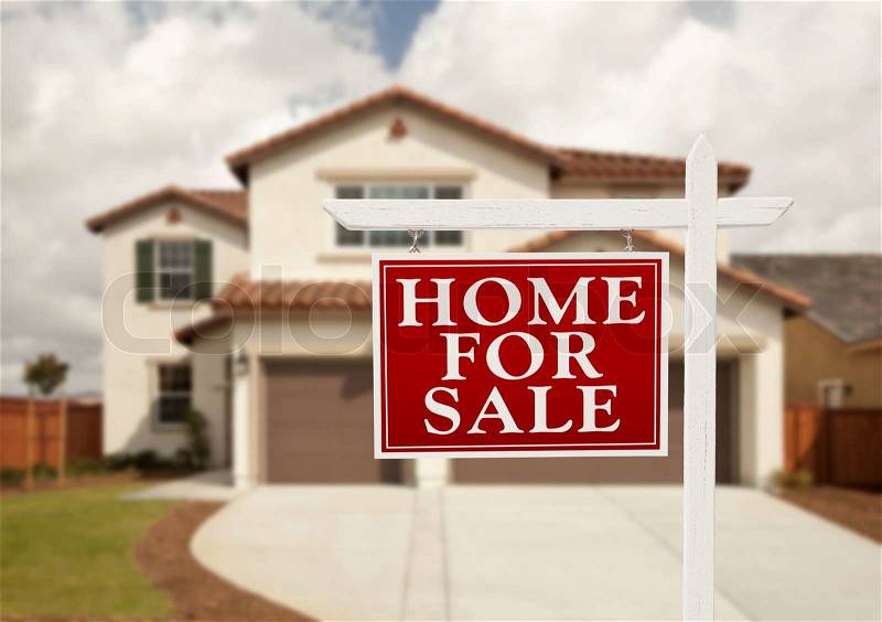 Home For Sale Real Estate Sign in Front of New House, stock photo