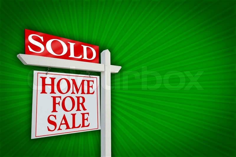 Sold Home for Sale sign on dramatic green background, stock photo