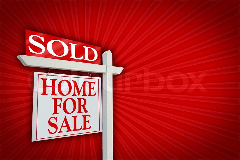 Sold Home for Sale sign on dramatic red background, stock photo