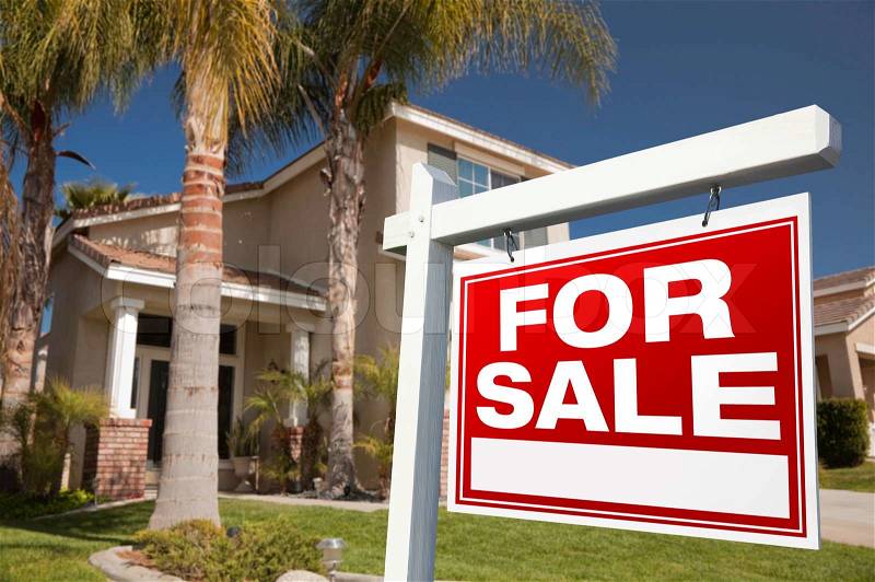 For Sale Real Estate Sign in Front of House, stock photo