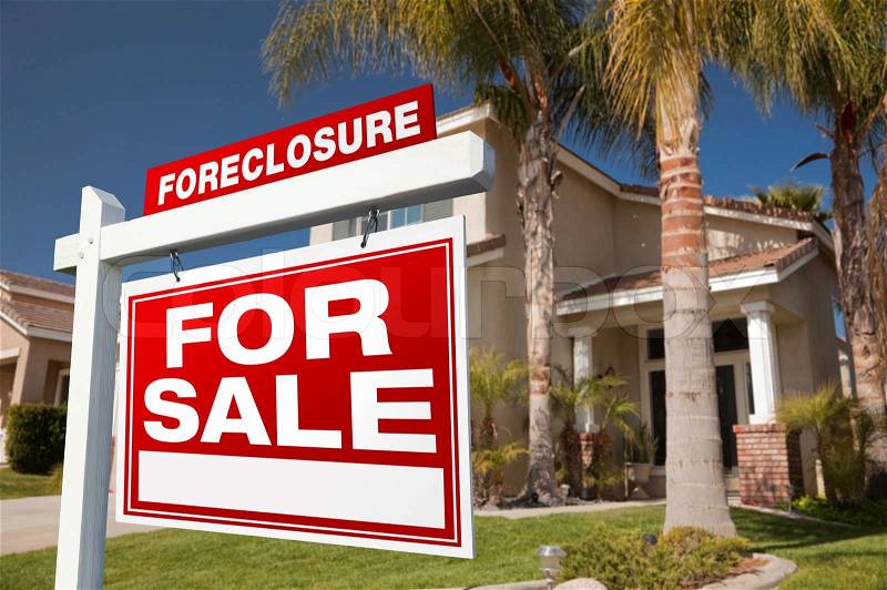 Foreclosure For Sale Real Estate Sign in Front of House, stock photo