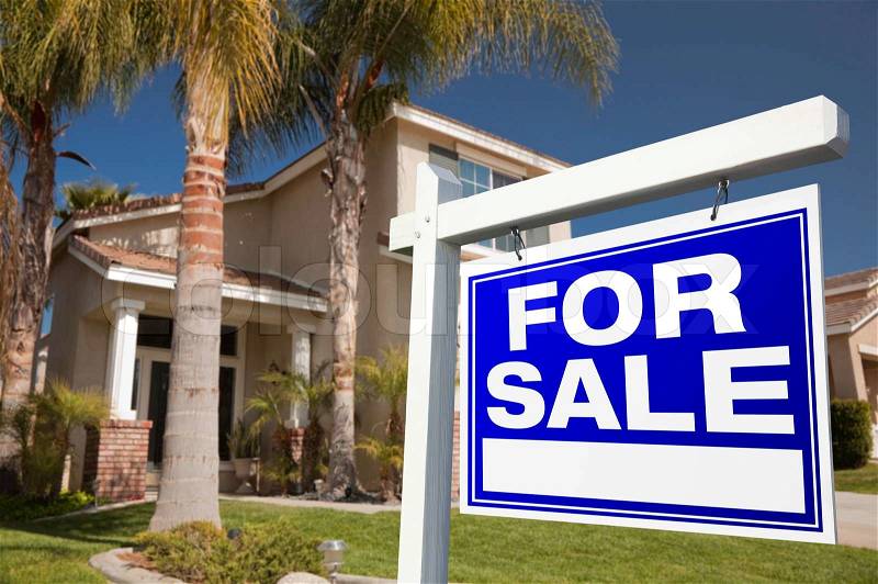 For Sale Real Estate Sign in Front of House, stock photo
