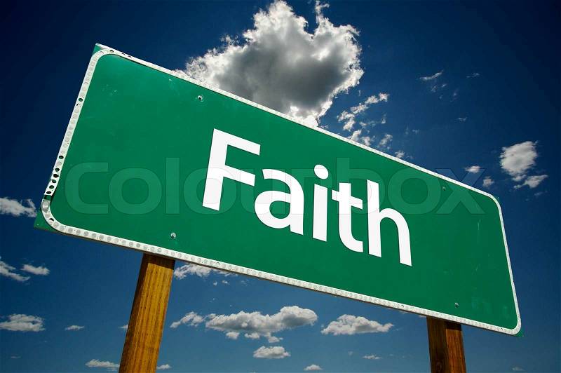 Faith Road Sign with dramatic clouds and sky, stock photo