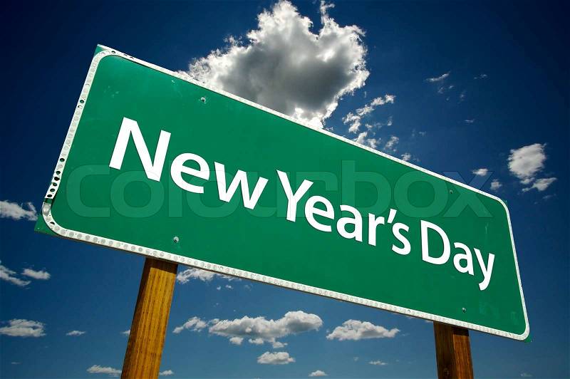 New Year\'s Day Road Sign with dramatic clouds and sky, stock photo
