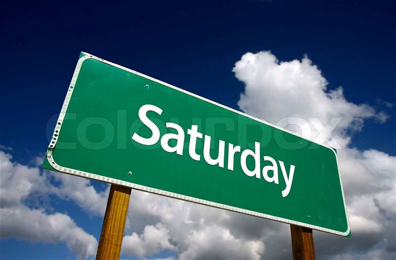 Saturday Green Road Sign with dramatic blue sky and clouds - Days of the Week Series, stock photo