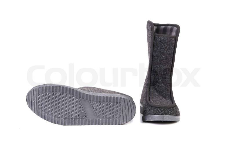 Pair of black felt boots. Isolated on a white background, stock photo