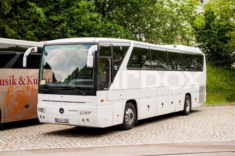 BADEN-BADEN, GERMANY - MAY 31, 2012: White Mercedes-Benz Tourismo coach bus parked in tourist sightseeing place in Baden, Germany on May 31, 2012. , stock photo