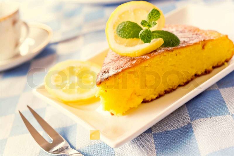 Fresh baked lime cake on the plat.Selective focus on the front part of cake , stock photo