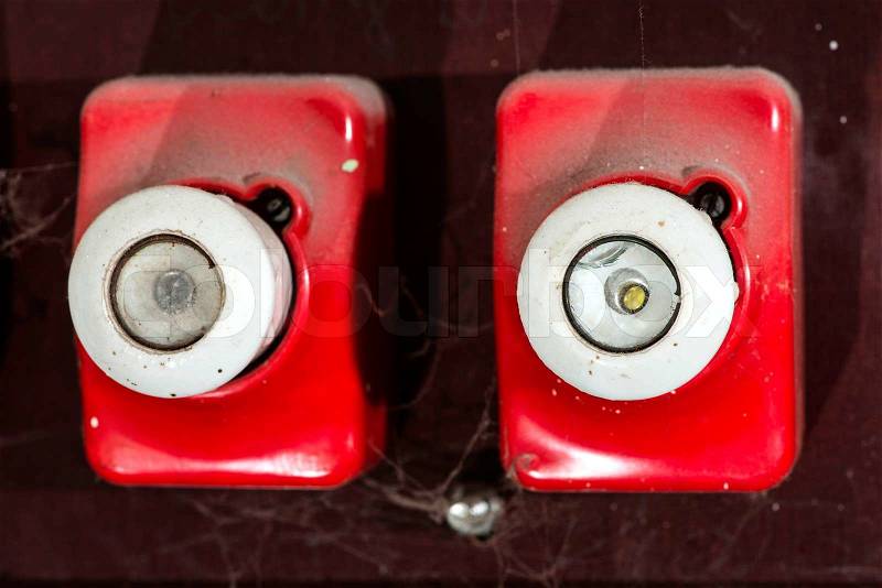 Red vintage electrical fuse. Switchboard, stock photo