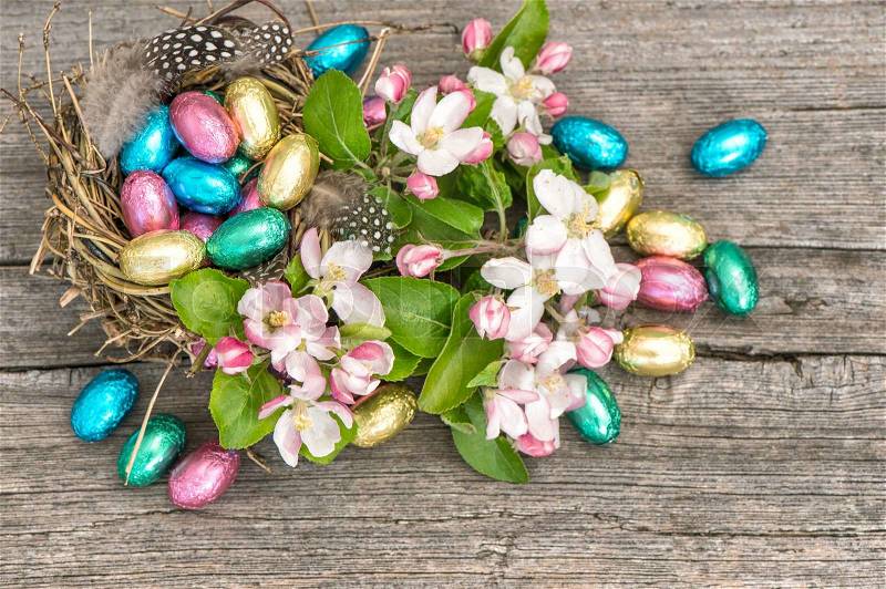 Easter eggs and apple blossoms. festive arrangement, stock photo
