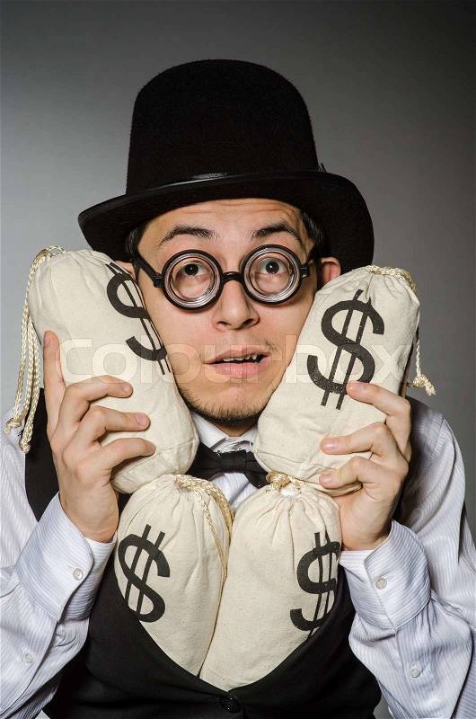 Man with sacks of money, stock photo